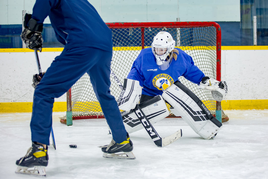 U15 goalie tracking a shot at Shield Goaltending